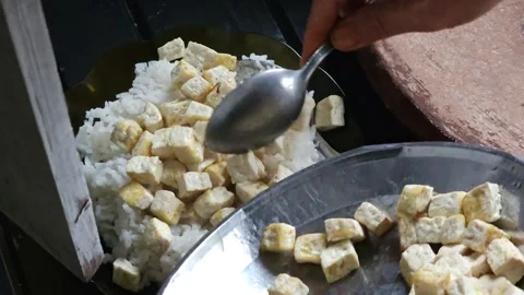 Serving Fried Tofu with White Rice and Sweet Soy Sauce Stock Footage 331992244
