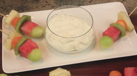 Serving Fruit Kebabs With Yogurt Stock-Footage 61201118