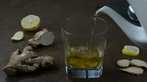 Serving ginger lemon water 動画素材 147368967