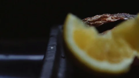 Serving grilled fish on a black background Stock Footage 121723070