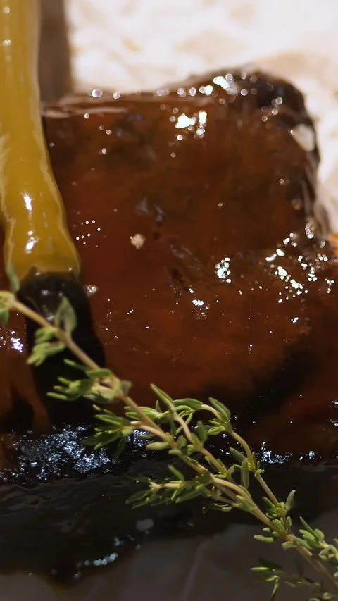 Serving of grilled meat. cooking. closeup. beautiful serving of juicy piece of Stock Footage 317167733