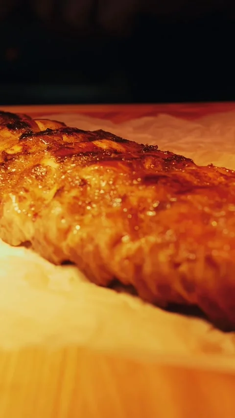 Serving of grilled meat. cooking. closeup. beautiful serving of juicy pork ribs. Stock-Footage 317703397
