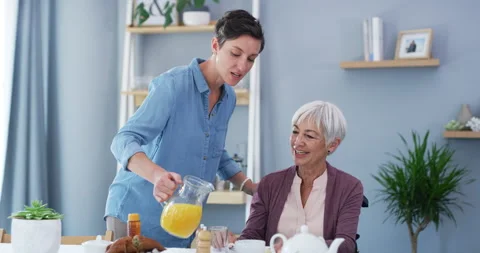 Serving her a meal stacked full of love. 4k video footage of a young woman Stock Footage 201368961