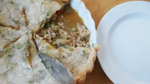 Serving homemade turkey pot pie Stock Footage 102740912