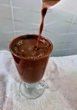 Serving hot chocolate in a cup. Stock Photos