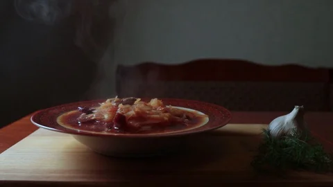 Serving hot red soup with sour cream Stock Footage 129338859