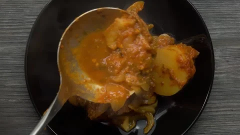 Serving a Hot Steaming Potato Casserole, Top View Stock Footage 314046088