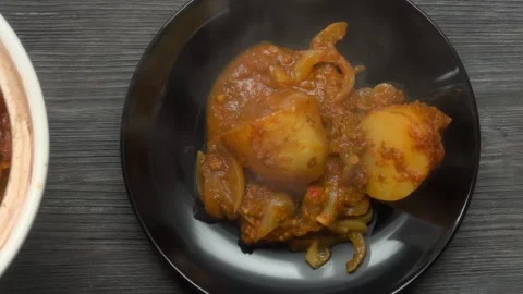 Serving a Hot Steaming Potato Casserole, Top View Stock Footage 328093775