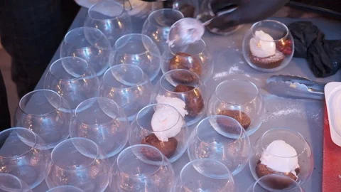 Serving ice cream in glass cups Stock Footage 128790939