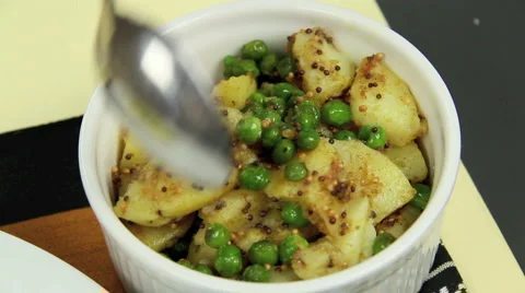 Serving Indian Curry Stock Footage 1091103