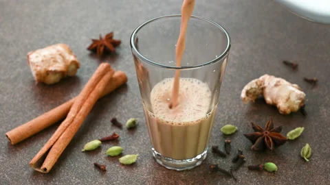 Serving indian masala tea Stock Footage 227694119