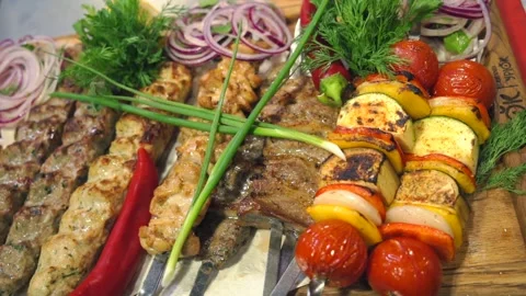 Serving kebabs in a meat restaurant. Stock Footage 131131634