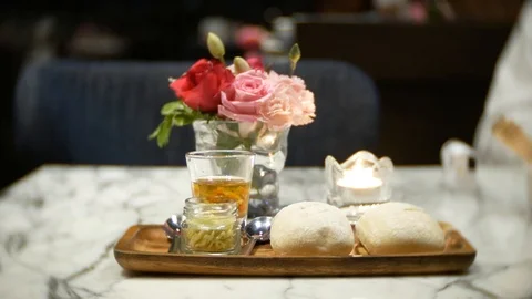 Serving lunch in the restaurant. bread plate with butter and sauce. 4k Stock Footage 86244565