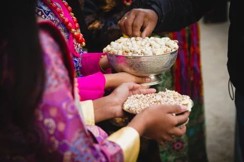 Serving Nuts at the Party Stock Photos