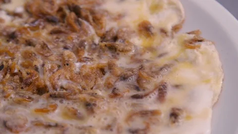 Serving omelet in a plate Stock Footage 87746527