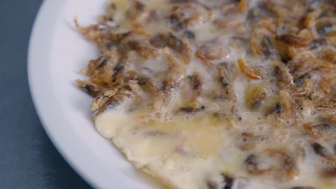 Serving omelet in a plate with lemon Stock Footage 87746672