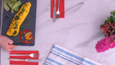 Serving omelets. Beautiful decoration. Light background. Slow motion Video stock 104825613