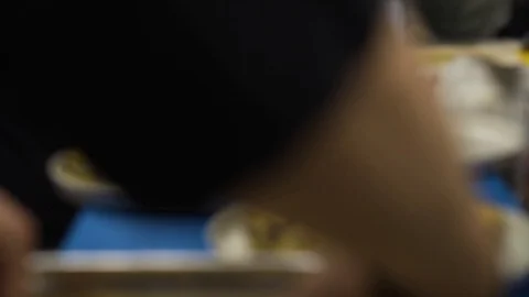 Serving omelette in a restaurant kitchen with four chefs Stock Footage 119117132