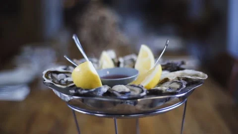 Serving oysters in a fish restaurant. Stock Footage 131412223