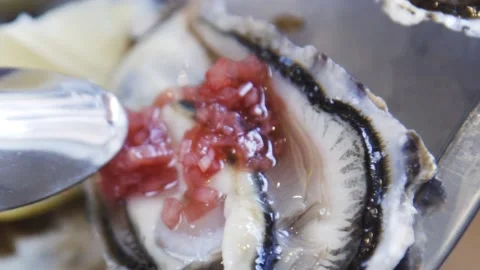 Serving oysters in a fish restaurant. Stock Footage 131412248