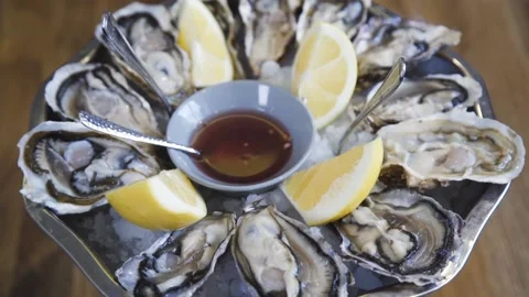 Serving oysters in a restaurant. Stock Footage 134236691