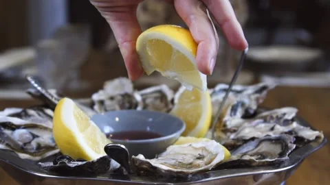Serving oysters in a restaurant. Stock Footage 134236725