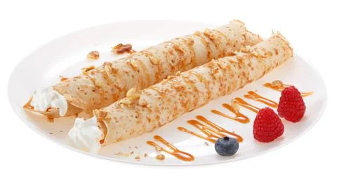 Serving pancakes with  blueberry, raspberry and whipped cream on the plate. D Stock Photos