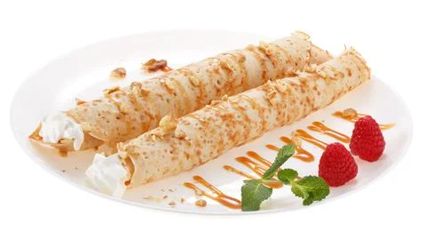 Serving pancakes with  nuts, raspberry and whipped cream on the plate. Decora Foto stock