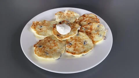 Serving pancakes with sweet cream Stock Footage 341983092