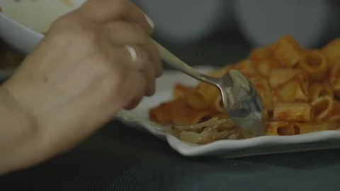 Serving pasta with tomato sauce Stock Footage 88327276