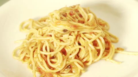 Serving Pasta with Tomato Sauce Stock Footage 135673757