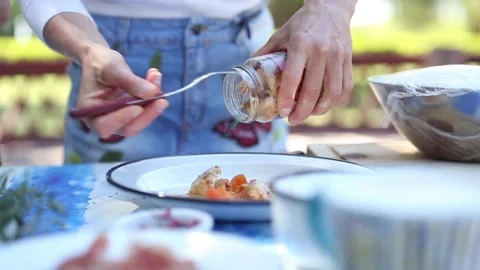 Serving pickled rabbit in a glass jar Video stock 133748710