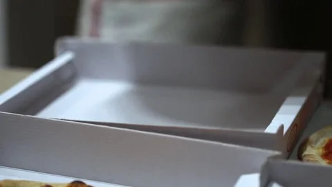 Serving pizza in paper boxes  Stock Footage 71490465