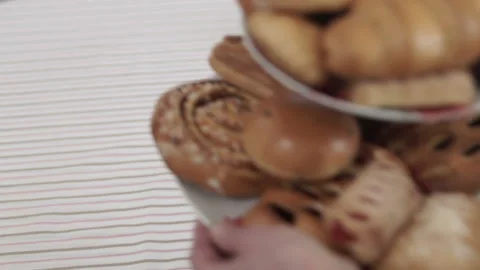 Serving a plate with a bakery on the table Video stock 87990591