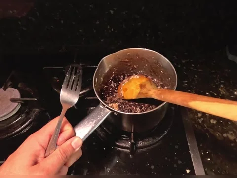 Serving a plate of beans with cheese. Stock Footage 319948074