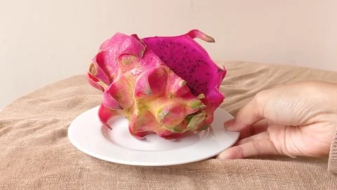 Serving a plate of dragon fruit Stock Footage 146253329