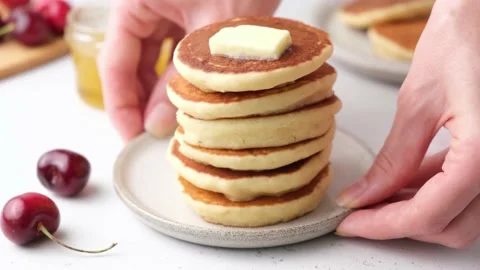 Serving plate with stack of pancakes Stock Footage 157487366