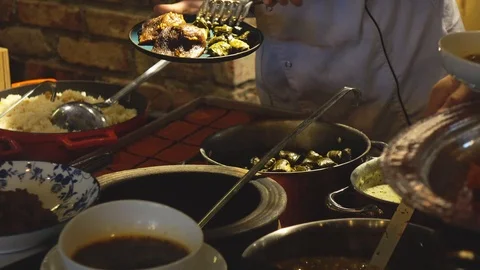 Serving to plates in a restaurant Stock Footage 99251134