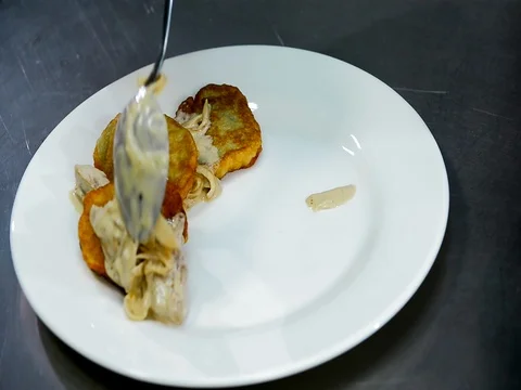 Serving of potato pancakes on a plate Stock Footage 71125412