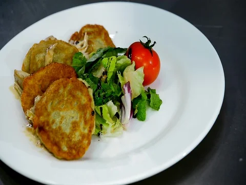 Serving of potato pancakes on a plate Stock Footage 71133616