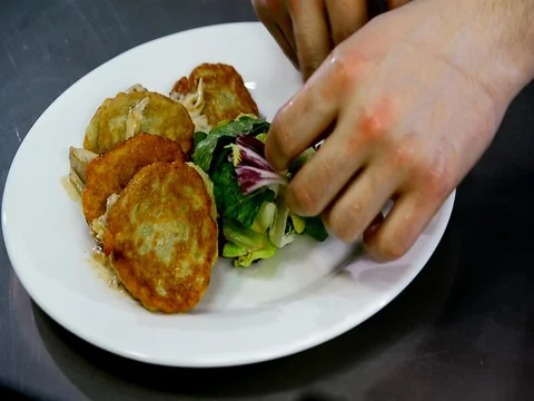 Serving of potato pancakes on a plate Stock Footage 71135228
