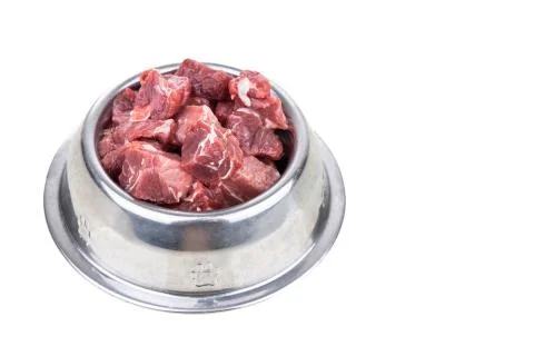 Serving of raw barf beef meat chunk for dog meal Stock Photos