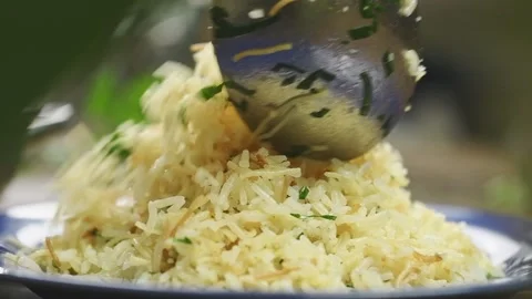 Serving rice pilaf with vermicelli. Stock Footage 165466780