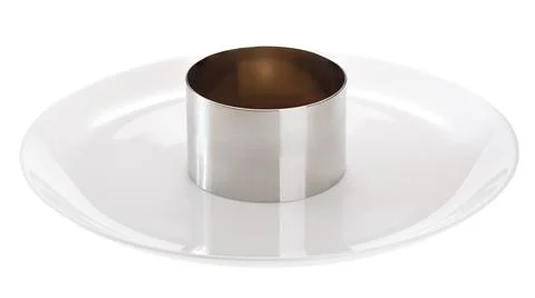 The serving ring is prepared on a serving plate. isolated on white background Foto stock