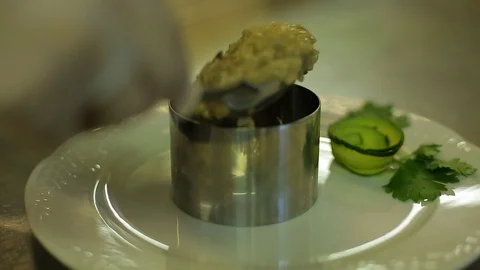 Serving risotto in a dish Stock Footage 88439509