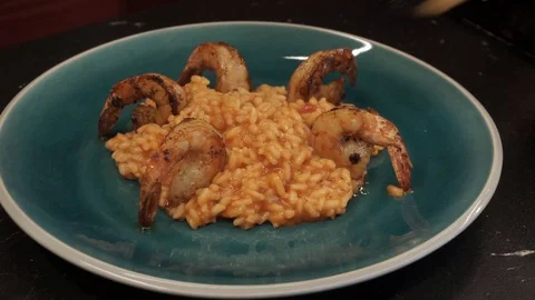 Serving risotto with scallops Stock Footage 112127269