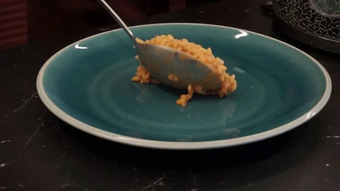 Serving risotto with seafood Stock Footage 112127242