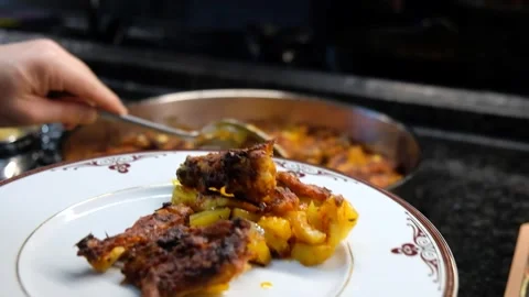 Serving Roasted Chicken and Potatoes from a Tray to Plate – Close-Up Kitchen Video stock 274894527