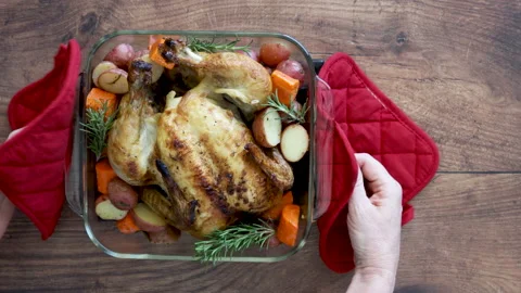 Serving Roasted Chicken and Root Vegetables Stock Footage 162200499