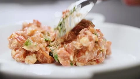 Serving of roasted red pepper and feta cheese dip. Stock Footage 152529813